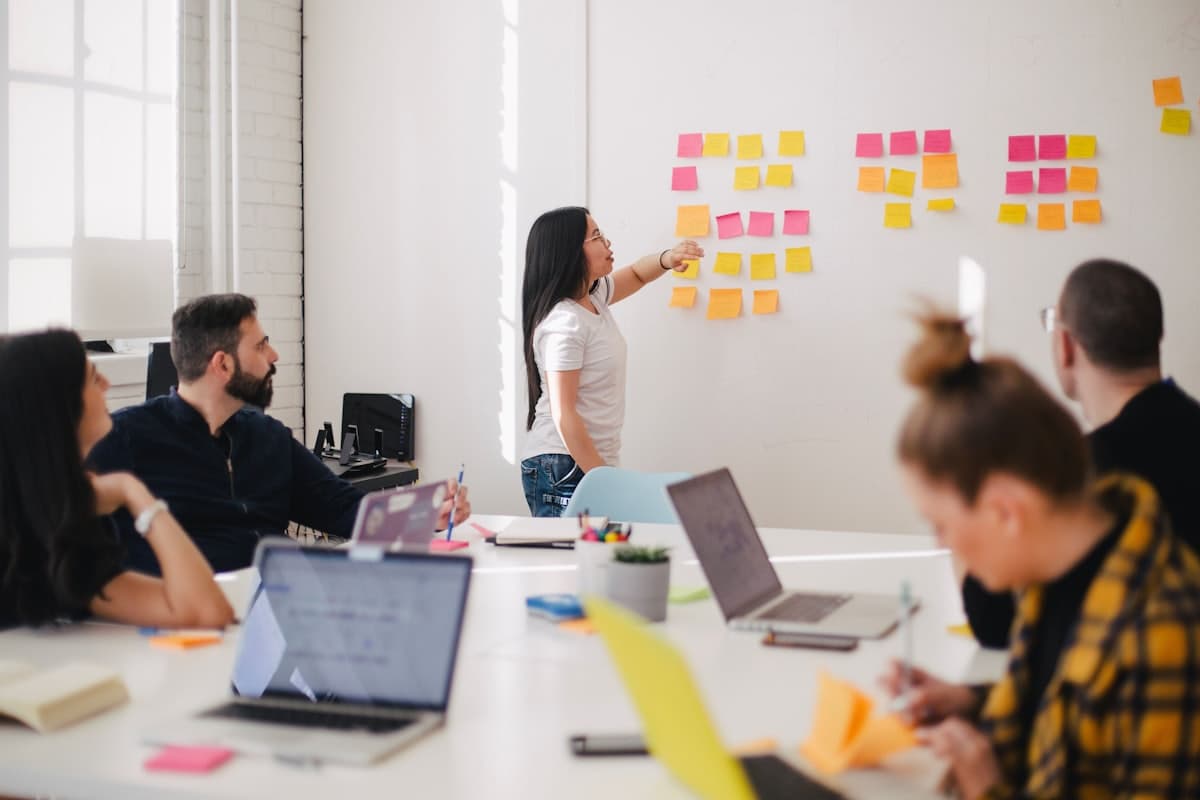 A batch of ten interns in a mentorship group session